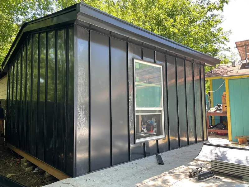 Black standing seam metal wall panels for Roof Inspection in Northchase