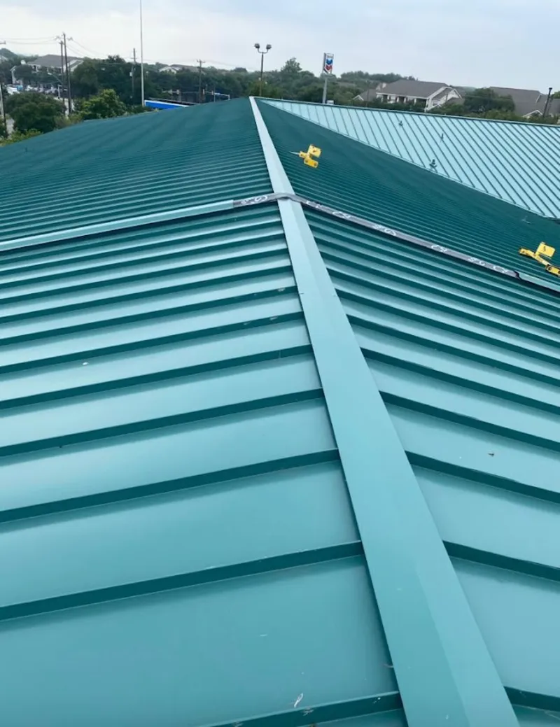Green commercial metal roof ridge and valley for Metal Roof Repair in Northchase